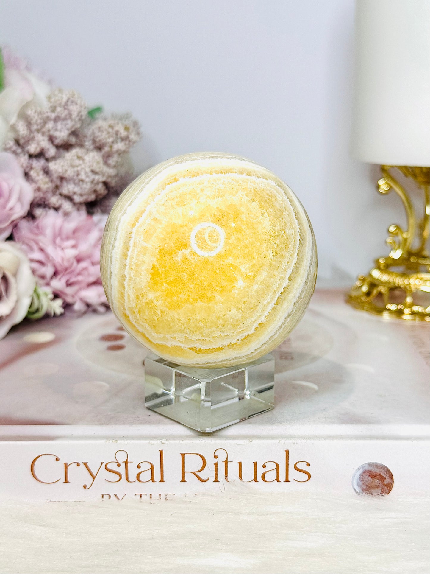Natural Orange Calcite Sphere On Stand 350g