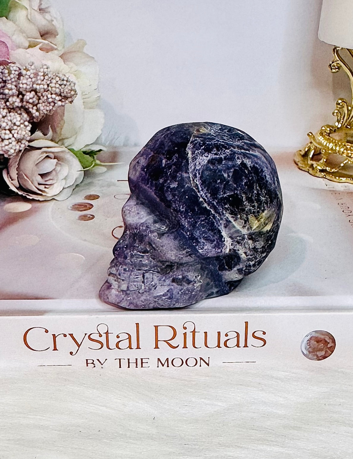 Purple Root Fluorite Carved Skull 288grams