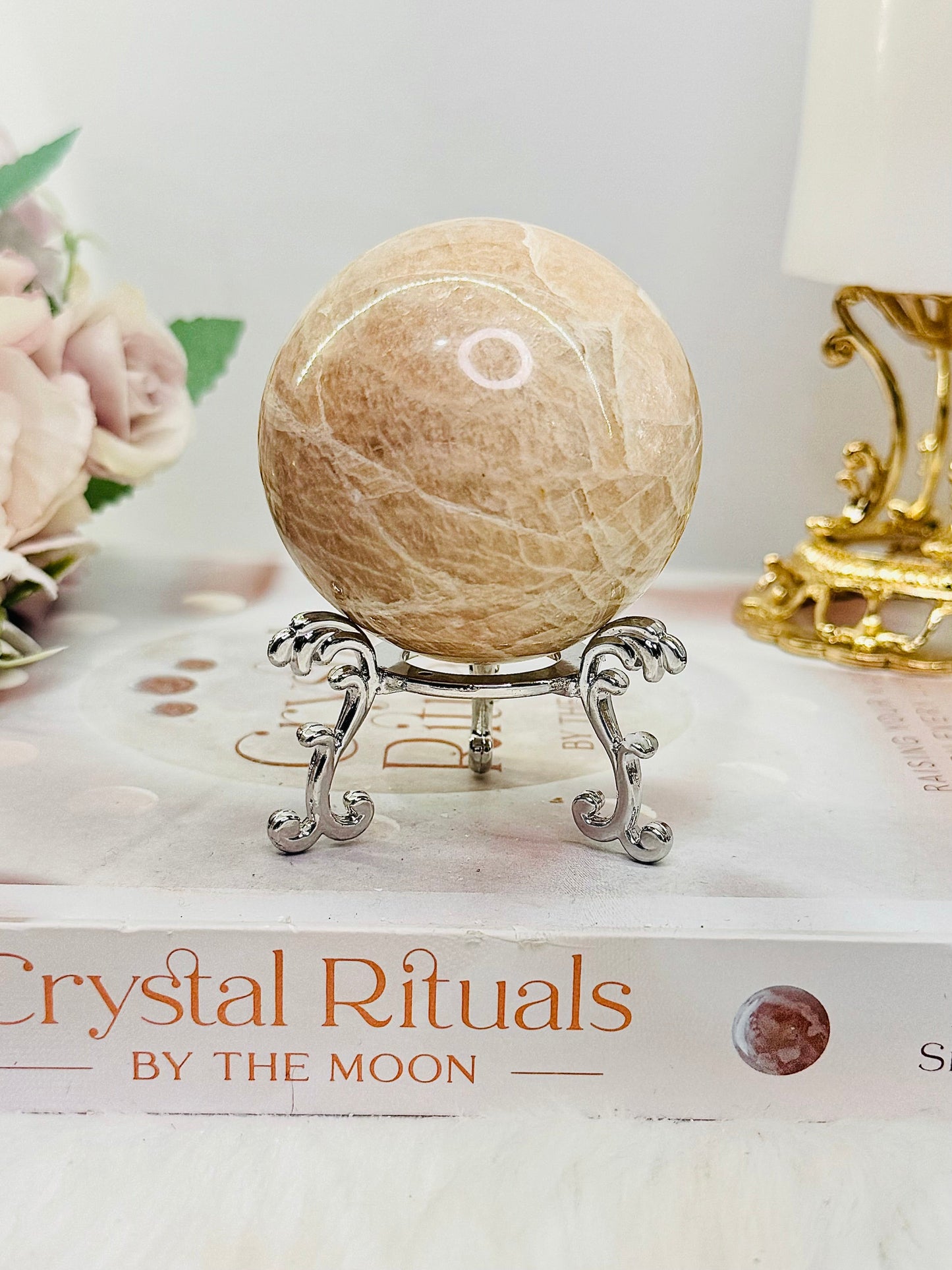 Peach Moonstone Sphere with Flash on Stand 223g