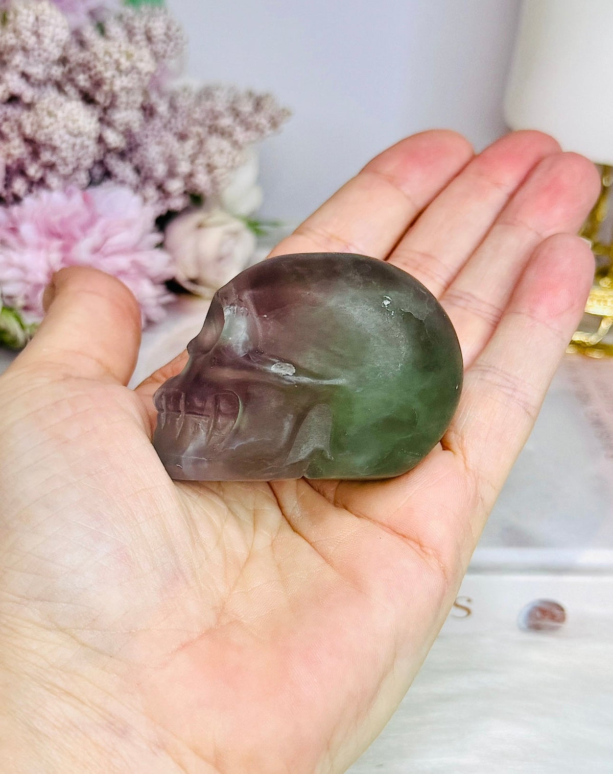 Purple & Green Fluorite Skull (photo taken under light)