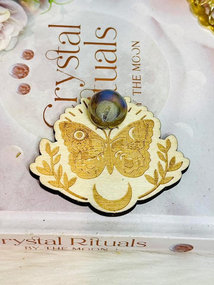 Angel Aura Druzy Sphere on Timber Moth Stand