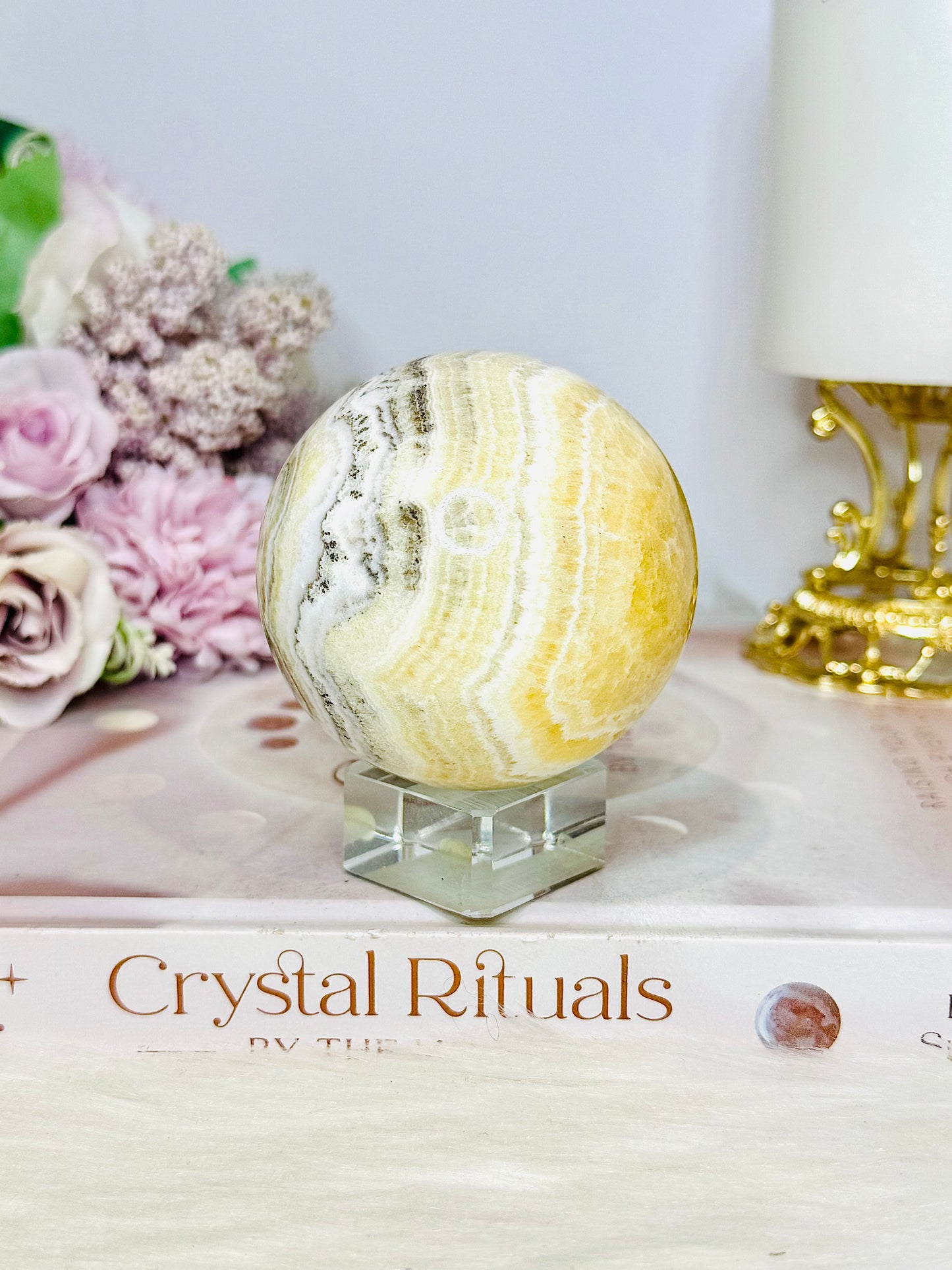 Natural Orange Calcite Sphere On Stand 350g