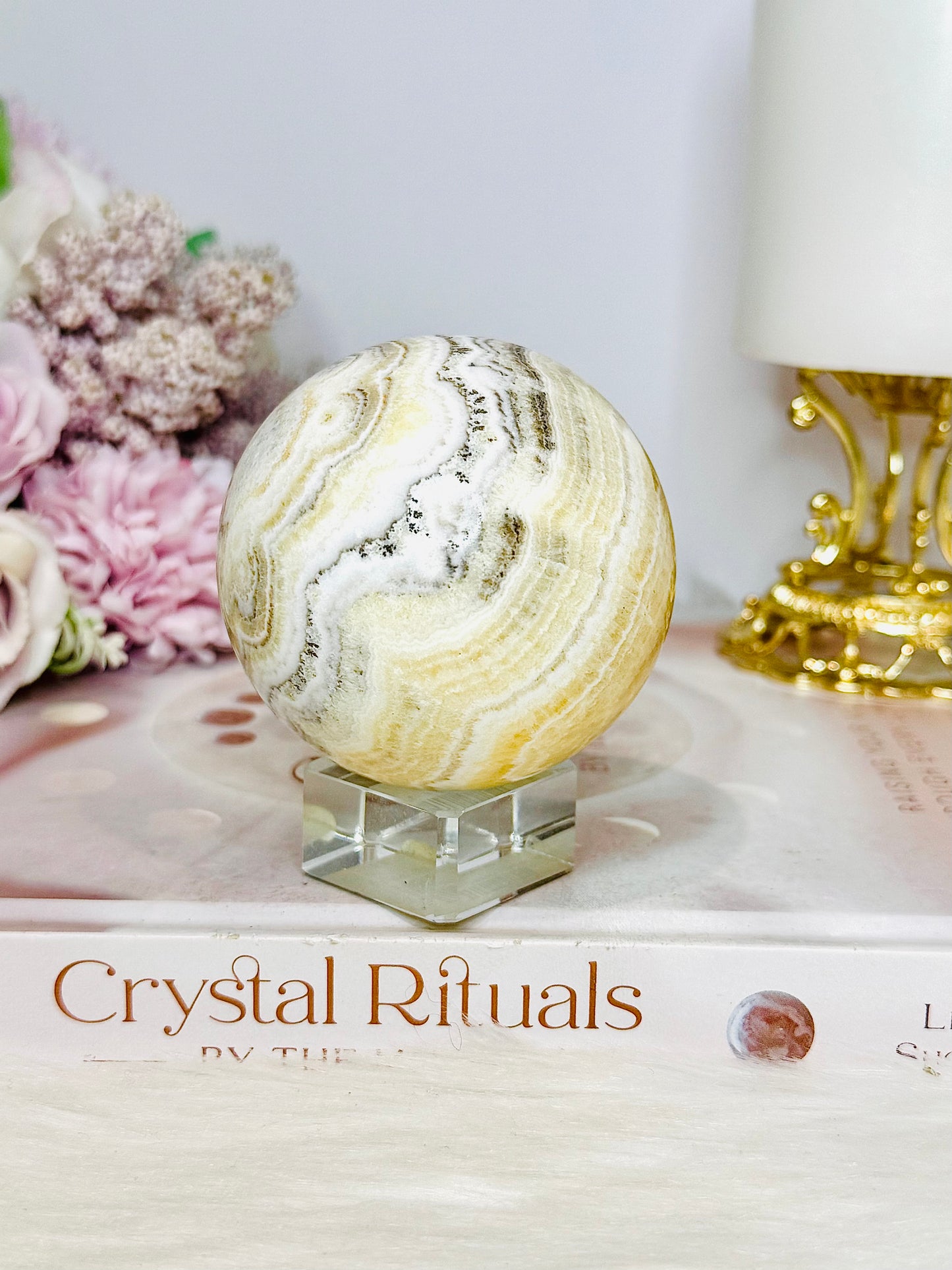 Natural Orange Calcite Sphere On Stand 350g