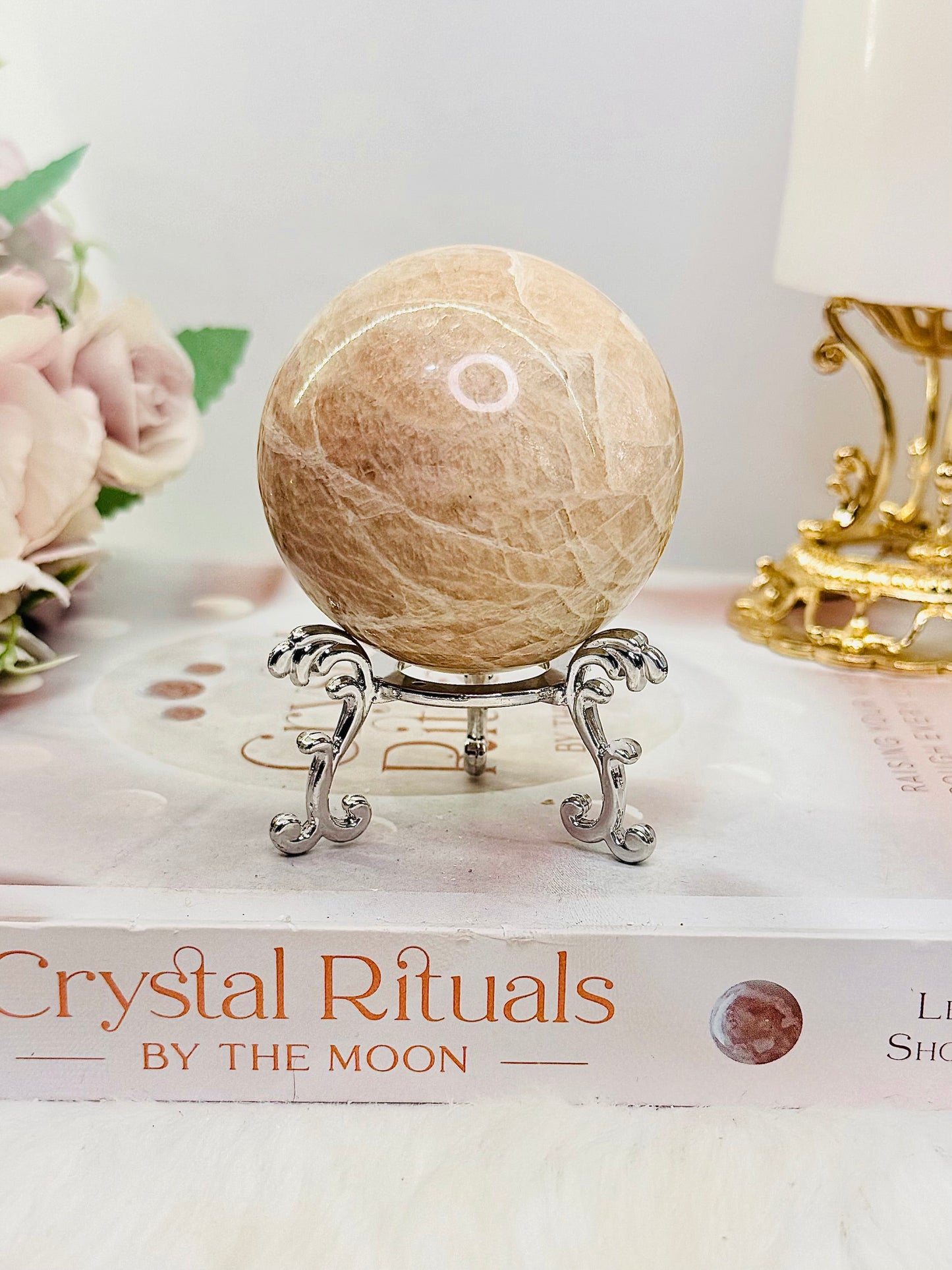 Peach Moonstone Sphere with Flash on Stand 223g