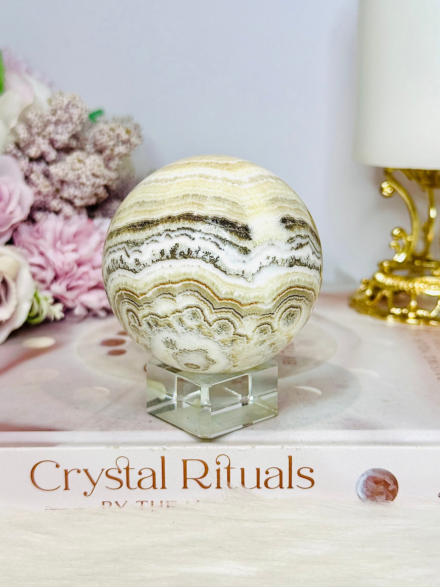 Natural Orange Calcite Sphere On Stand 350g