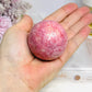 Thulite Sphere with Epidote 199g On Stand
