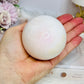 Large Mangano Calcite Sphere (UV Reactive) On Stand 420g