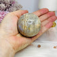 Moonstone Sphere with Blue Flash 6.5cm On Stand