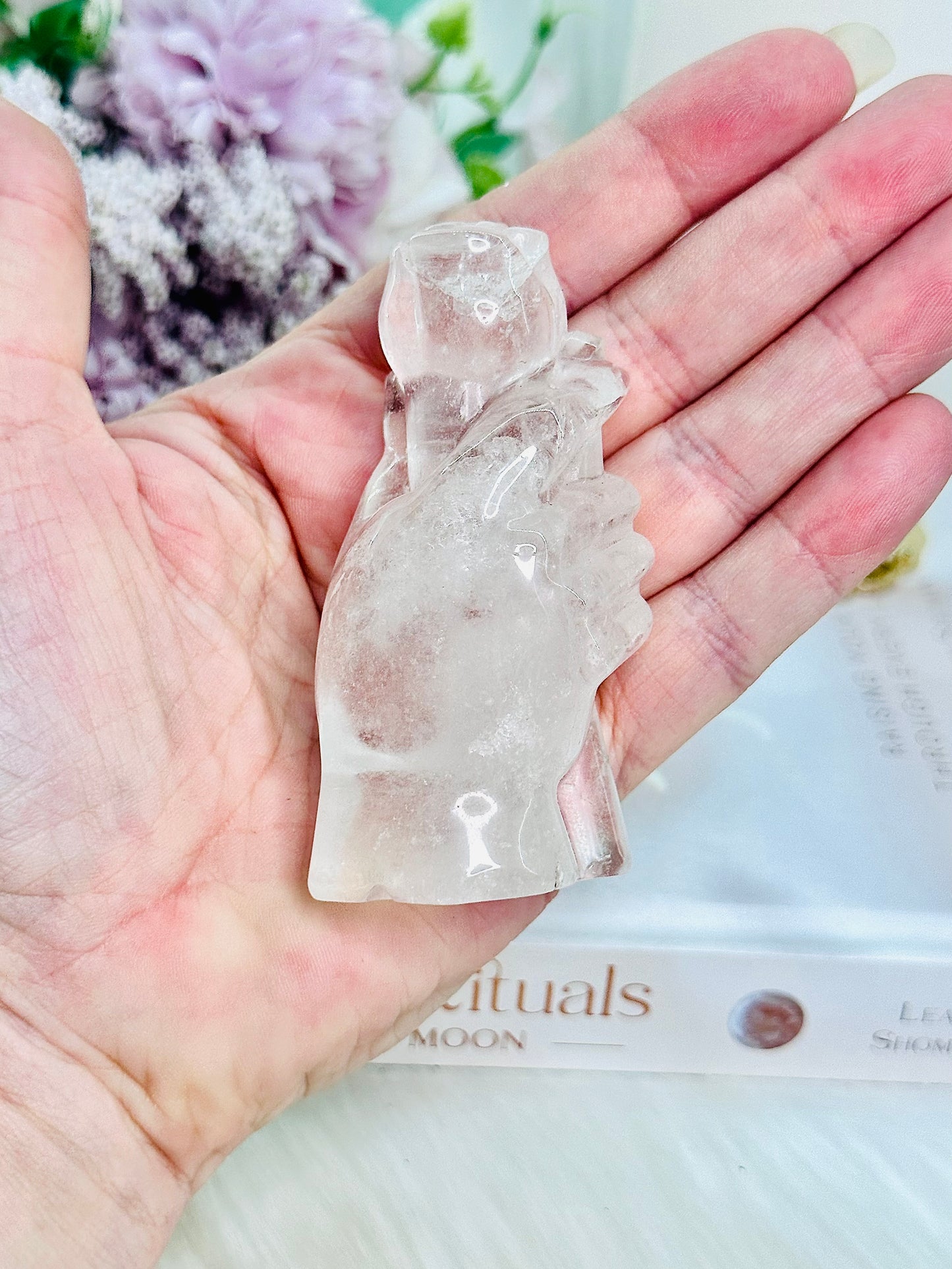 Perfectly Carved Clear Quartz Hand Holding A Rose