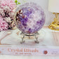 CLASSY!!! FABULOUS!!! MAGICAL!!!
Incredible High Grade Deep Purple Amethyst X Flower Agate Hybrid Sphere 772grams On Silver Stand