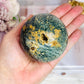 Orbicular Ocean Jasper Druzy Sphere on Stand 418g