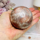 Shimmering Large Sunstone with Moonstone Sphere on Stand 433g