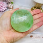Green Fluorite Sphere with Rainbows On Stand 444g