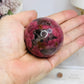 High Grade Rhodonite Sphere On Stand 200g