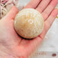 Peach Moonstone Sphere with Flash on Stand 223g