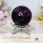 Large High Grade Purple Fluorite Sphere with Rainbows 336g