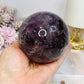 Large High Grade Phantom Amethyst Sphere with Rainbows On Stand 665g