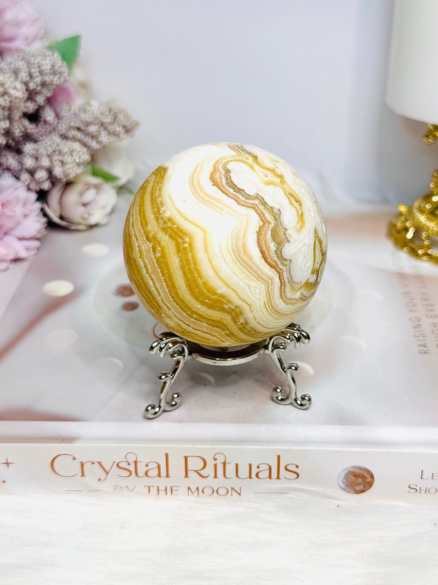Orange Calcite Sphere on Stand 335g