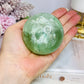 Large Green Fluorite Sphere Full of Rainbows On Stand 478g