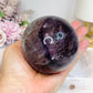 Large High Grade Phantom Amethyst Sphere with Rainbows On Stand 665g
