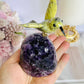 High Grade Deep Purple Amethyst Base Cut Cluster with Jade Carved Hummingbird 13cm