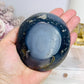 Agate Carved Bowl with Blue Calcite Chips 338g