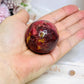 High Grade Rhodonite Sphere On Stand 168g