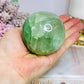 Large Green Fluorite Sphere Full of Rainbows On Stand 478g