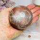 Shimmering Large Sunstone with Moonstone Sphere on Stand 433g