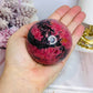 Large Rhodonite Sphere 551g On Stand