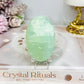 Pistachio Calcite Palm Stone (stand is display only)