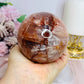 High Grade Large Fire Quartz | Hematoid Quartz Sphere with Rainbows on Stand 725g