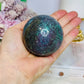 Ruby in Kyanite (UV Reactive) Sphere on Timber Stand 447g