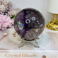 Large High Grade Phantom Amethyst Sphere with Rainbows On Stand 665g