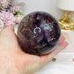 Large High Grade Phantom Amethyst Sphere with Rainbows On Stand 665g