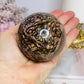 Large Rhodonite Sphere 561g On Stand
