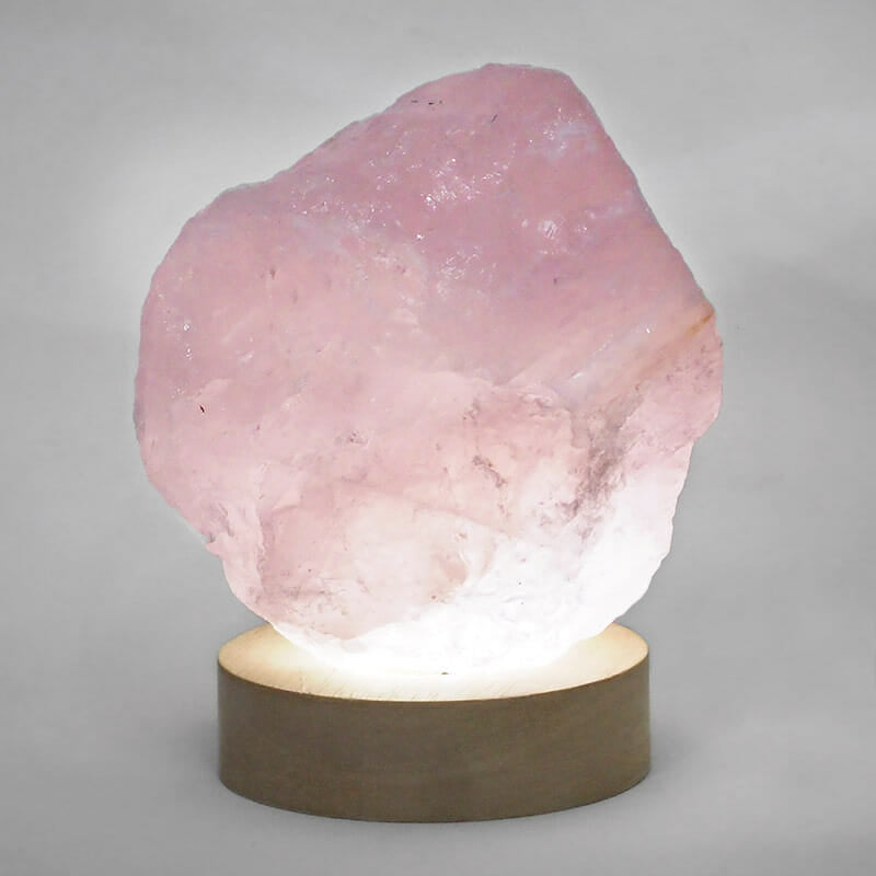 Rose Quartz Rough Approx 750g on LED Light Base