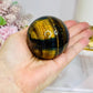 Tigers Eye Sphere with Blue Flash 279g
