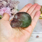 Purple & Green Fluorite Skull (photo taken under light)