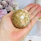 Unakite Sphere on Stand 205g