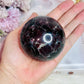 Large Garnet In Astrophyllite Sphere on Stand 532grams