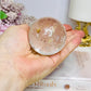 Clear Quartz Sphere With Golden Healer Inclusions 233g
