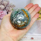 Moss Agate Druzy Sphere On Stand 373g
