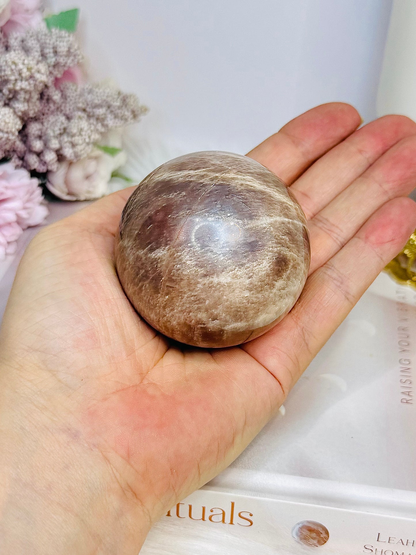Shimmering Sunstone with Moonstone Sphere on Stand 250g