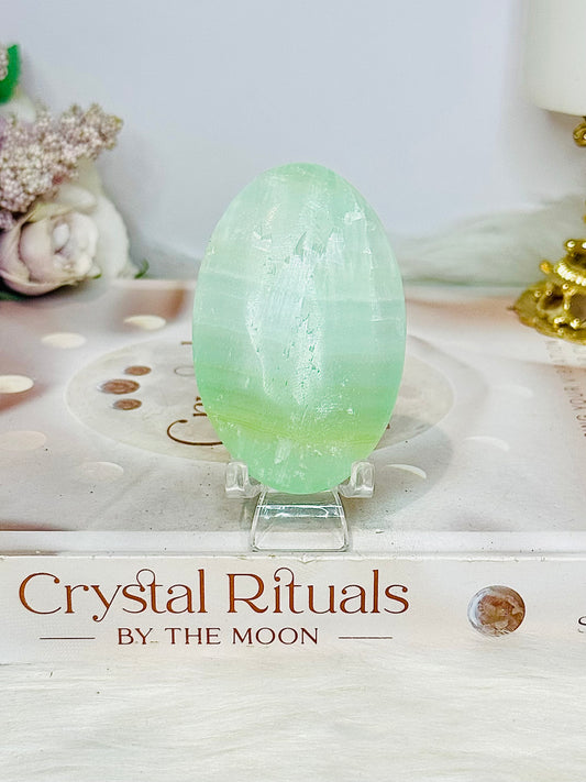 Pistachio Calcite Palm Stone (stand is display only)