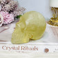 Citrine Carved Skull with Rainbows 8cm 399g