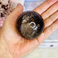 Beautiful 265gram Smokey Quartz Sphere with Rainbow on Stand