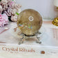 High Grade Smokey Quartz Sphere Full of Rainbows on Stand 307g
