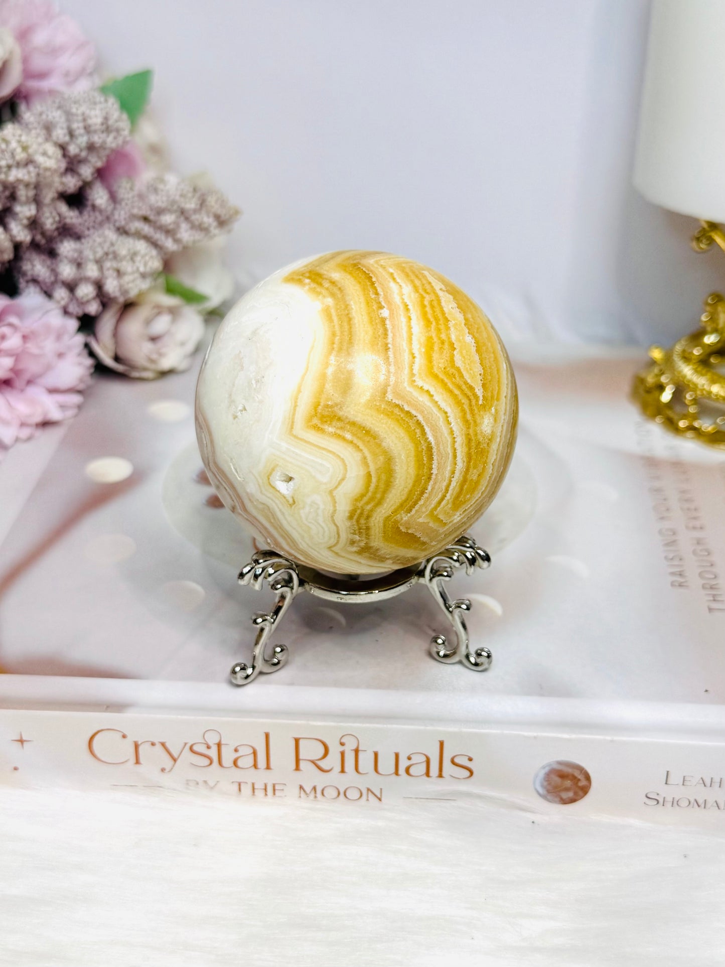Orange Calcite Sphere on Stand 335g