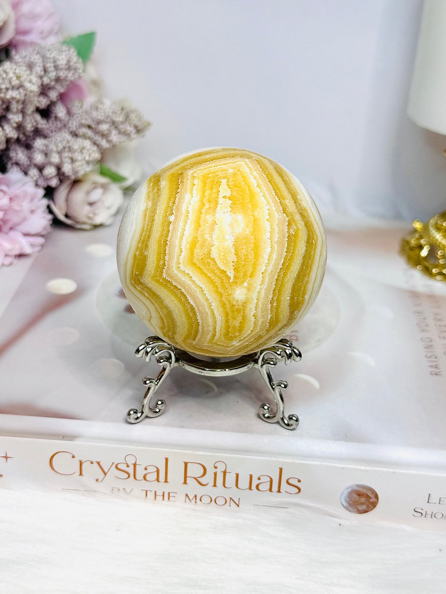 Orange Calcite Sphere on Stand 335g